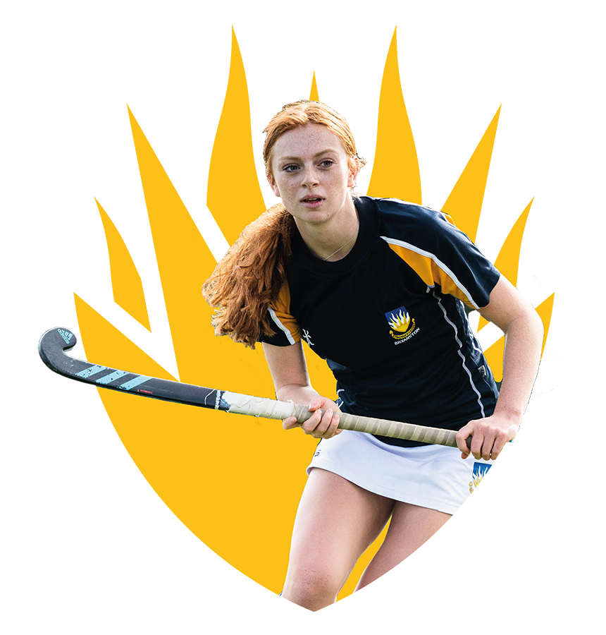 Image of a pupil playing hockey