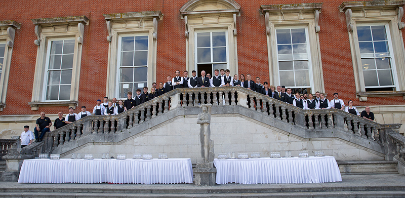 Image of the Catering team in front of the School