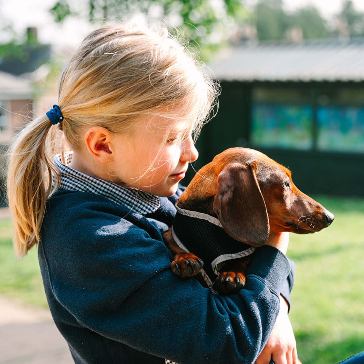 Prep school girl with dog
