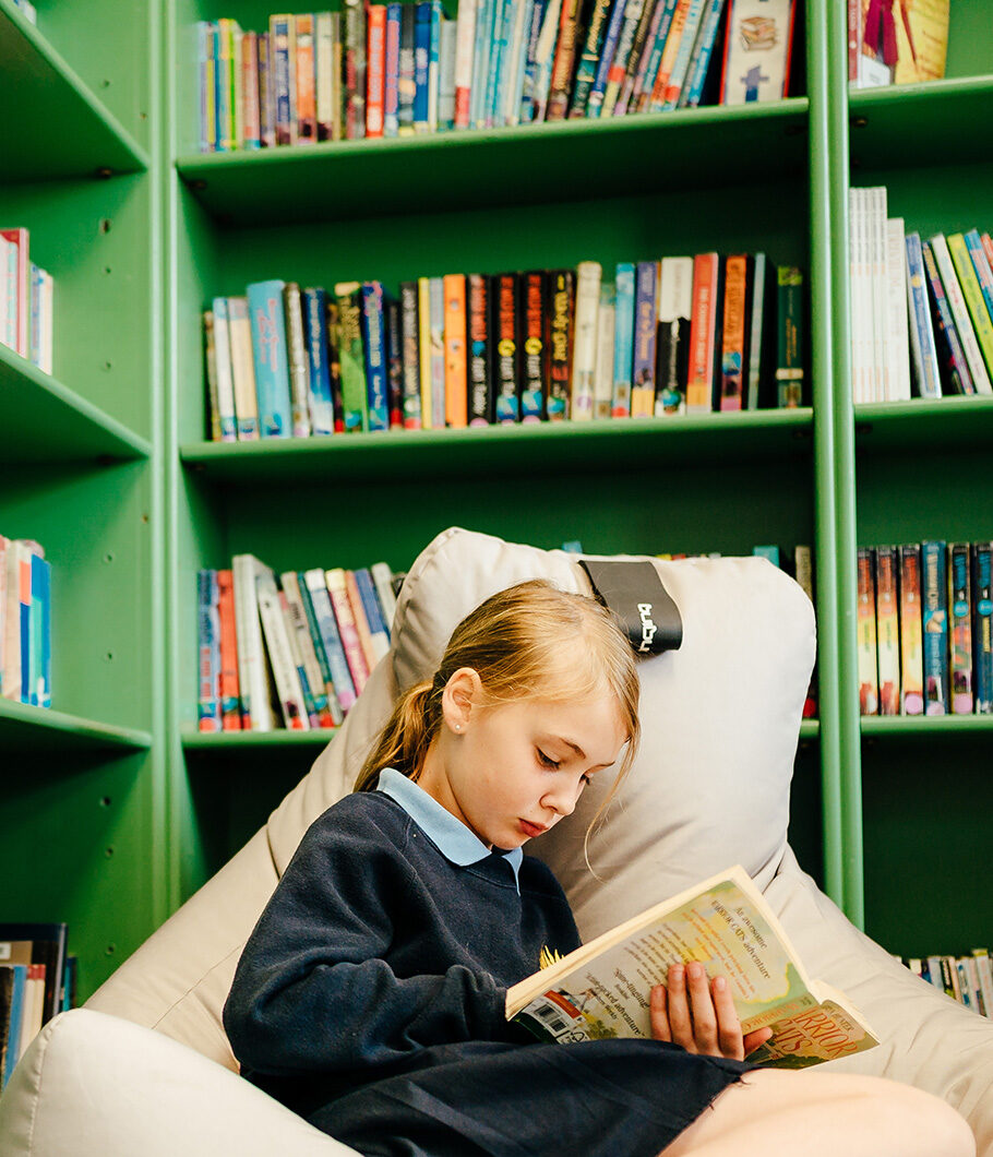 Girl in prep school library