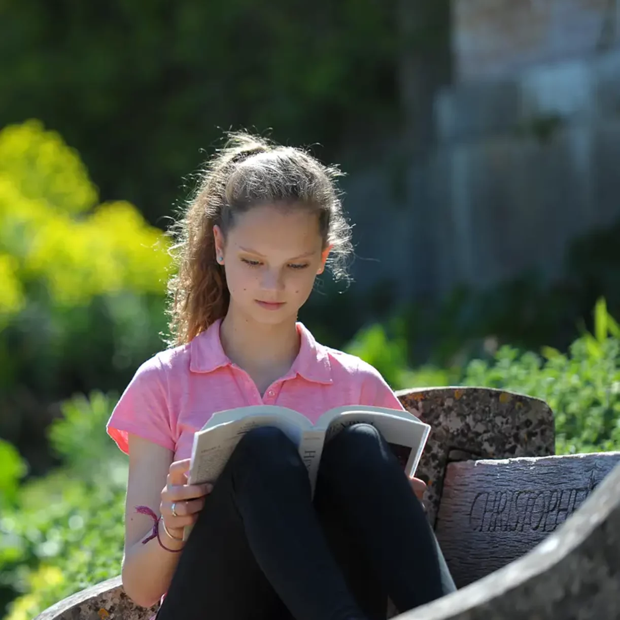 Boarding girl reading book