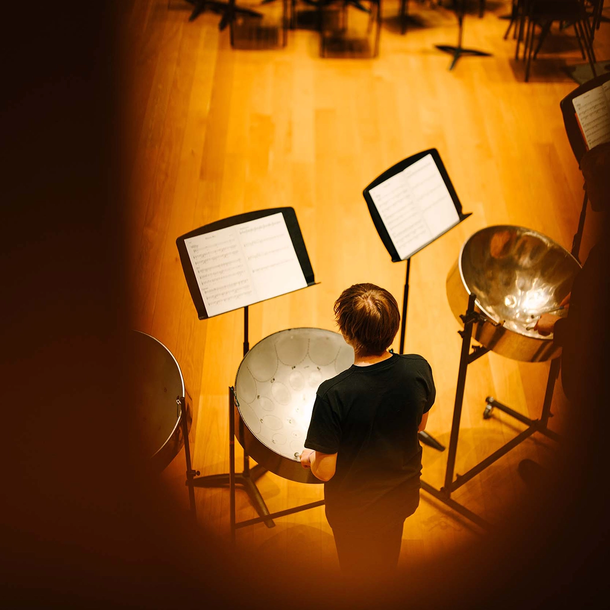 Music pupil playing percussion