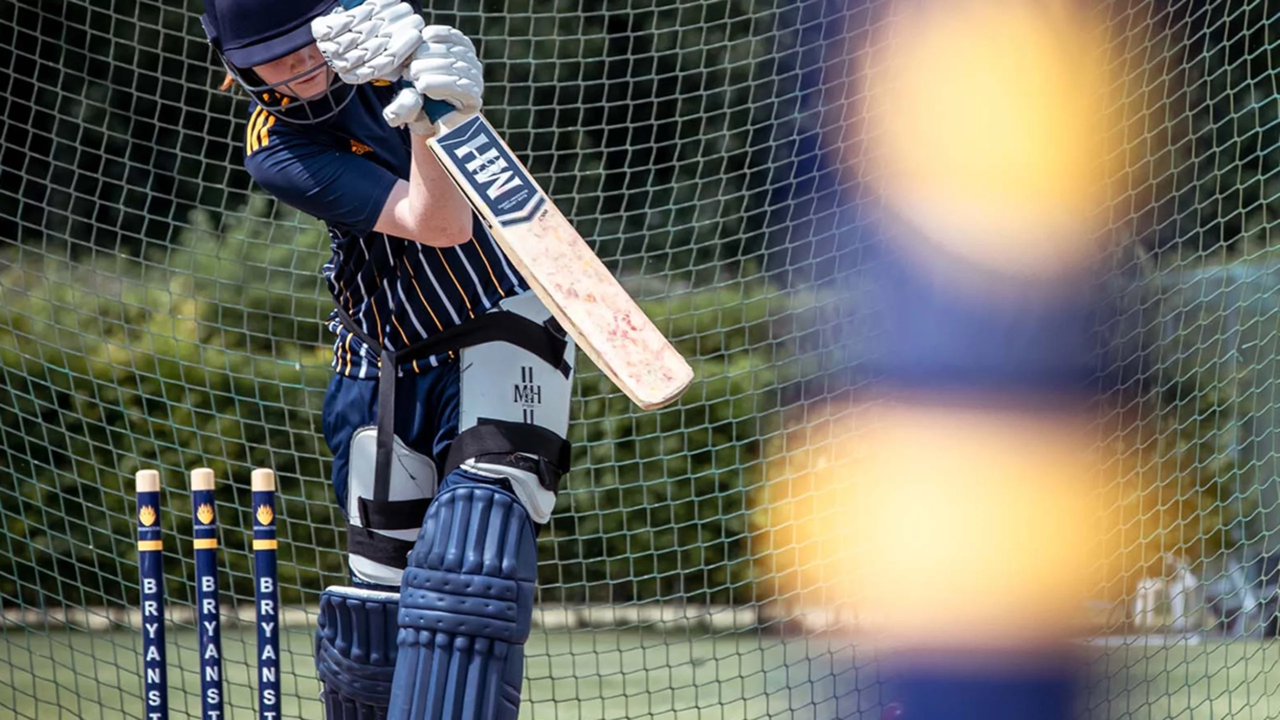 Pupil playing cricket