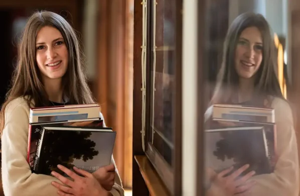 Pupil with books