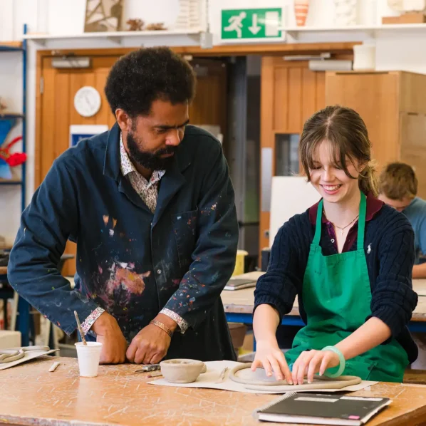 Art Pottery Teacher with Pupil